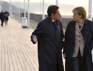 On euro anniversary, EU leaders warn of tough year ahead