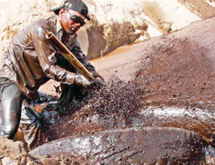 North increases pressure on central Iraq for Exxon accord