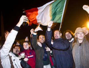 Cheers as Berlusconi quits amid eurozone crisis