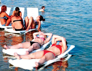 Higher euro, dollar, good for tourism, firm says