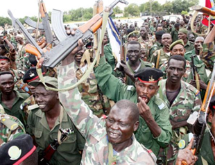 Sudans clash, president warns of war