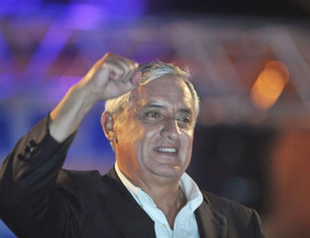 Ex-general wins presidency in violent Guatemala