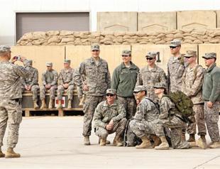 US lowers flag in Iraq, ends long occupation