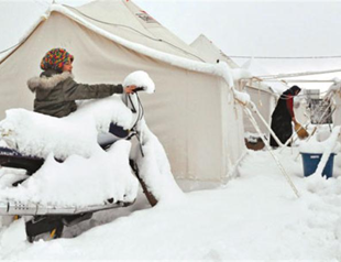 Cold temperatures take over life in quake town