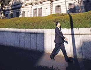 BOJ warns Japan exports to stay flat