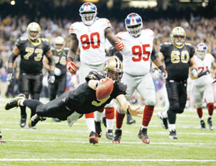 Brees brilliance powers Saints past NY Giants