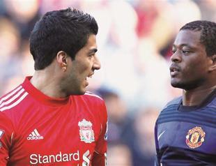 Uruguay mates leap to Suarez defense after eight-match ban