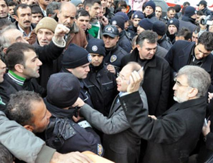 Tension rises in quake town