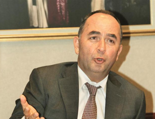 Market czar accused of violating regulation