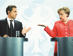 Paris, Berlin aim to rebuild EU on euro