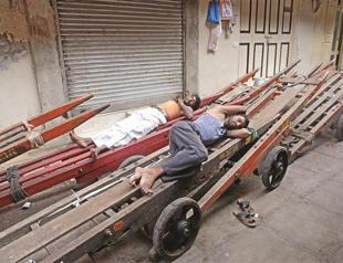 India retreats on plan to invite foreign malls