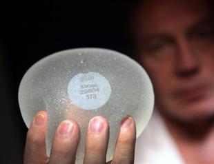 France urges removal of breast implants