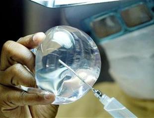 Pressure mounts on maker of unsafe breast implants