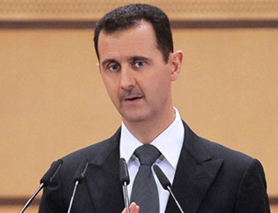 Assad vows no exit