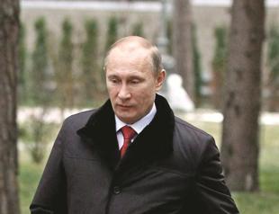 Putin rebukes Clinton for fueling rallies