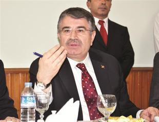 Interior minister under fire over terror charges