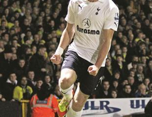 Bale double eases Spurs past Norwich