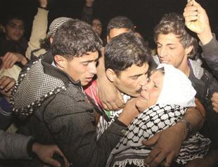 Freed inmates return to West Bank