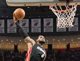 LeBron returns, Heat cruise past New Jersey