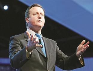 British premier hits at ‘mad tax,’ attacking EU