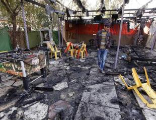 Suicide car bomb outside Baghdad hospital kills 31