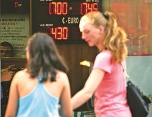 Bank burns reserves to defend lira against dollar