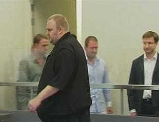 Megaupload founder denies piracy, demands release