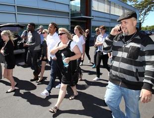 Dotcom denies charges, rival stops file-sharing