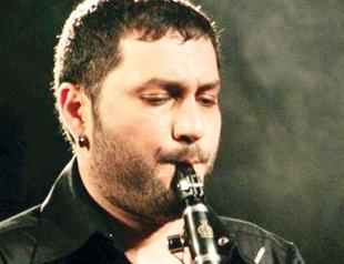 HÜSNÜ ŞENLENDİRİCİ