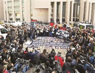 Court rules against freeing journalists, case postponed