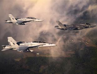 US Special forces raid frees US, Danish aid workers