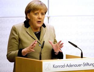Davos looks to German Chancellor Merkel to raise spirits