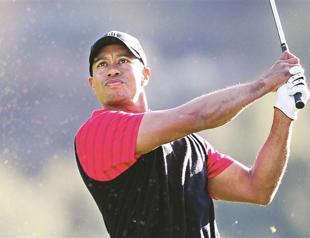 Woods is fit, happy, says Rory McIlroy