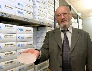 Ex-head of French breast implant maker arrested