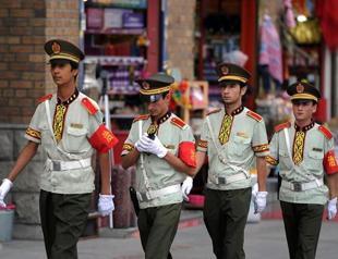 China says to increase police in Xinjiang for stability