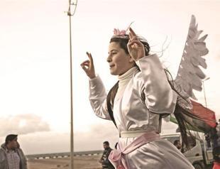 One year after uprising, militias sway in Libya