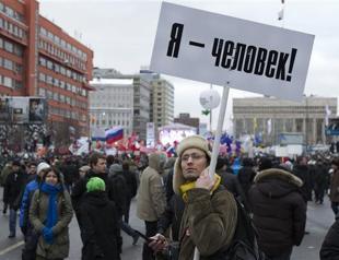 Putin slams opposition, rejects poll review