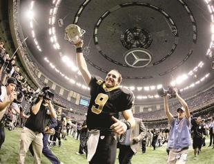 Brees sets passing mark as Saints top Falcons