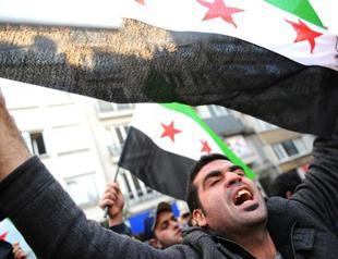Protesters storm Syria mission, Turkish police fire tear gas