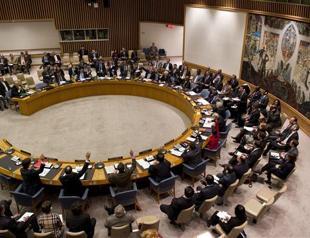 China defends Syria veto, denies sheltering Assad