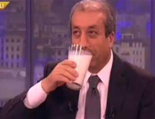 Minister drinks milk on live TV to allay cancer fears