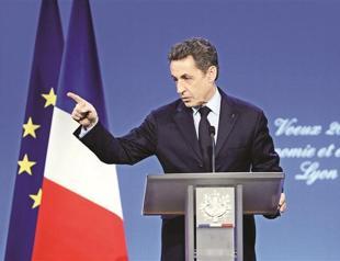 Sarkozy warns against intervention on Iran