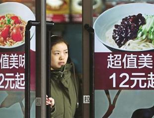 China insistent on yuan policy as inflation jumps