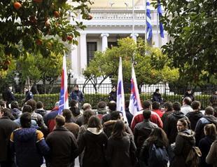 Athens strikes debt deal despite fury on the street