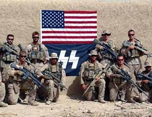 American marines pose with Nazi flag