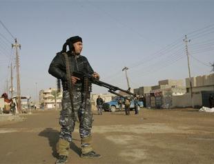 Wave of attacks as gunmen storm Iraq police station