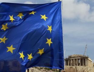 Greek debt deal draws mixed welcome across Europe