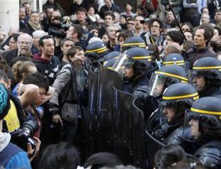 Sarkozy takes refuge in Basque bar as insults and eggs fly