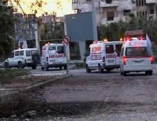 Aid convoy heads to Syrias battered Homs