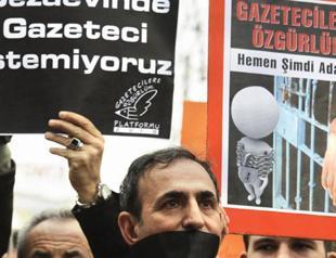 Rally to mark jailing of scribes